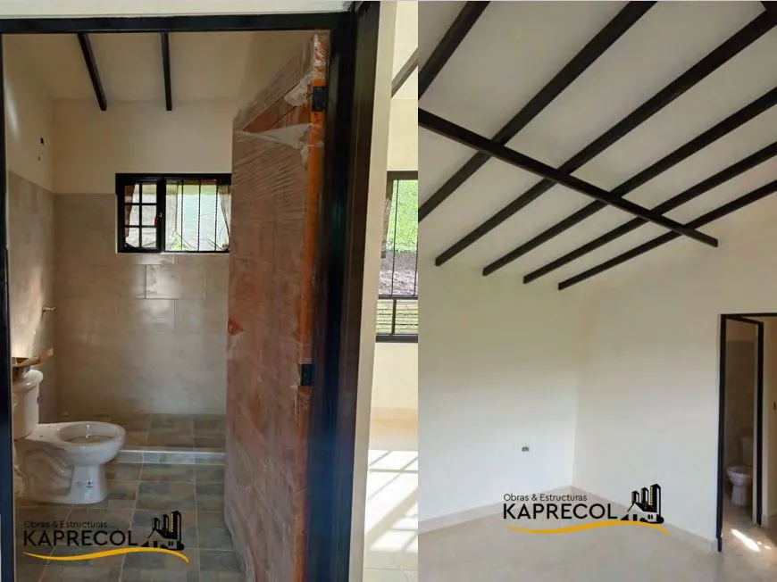 Acabado de baño con cerámica beige y sala vacía con vigas